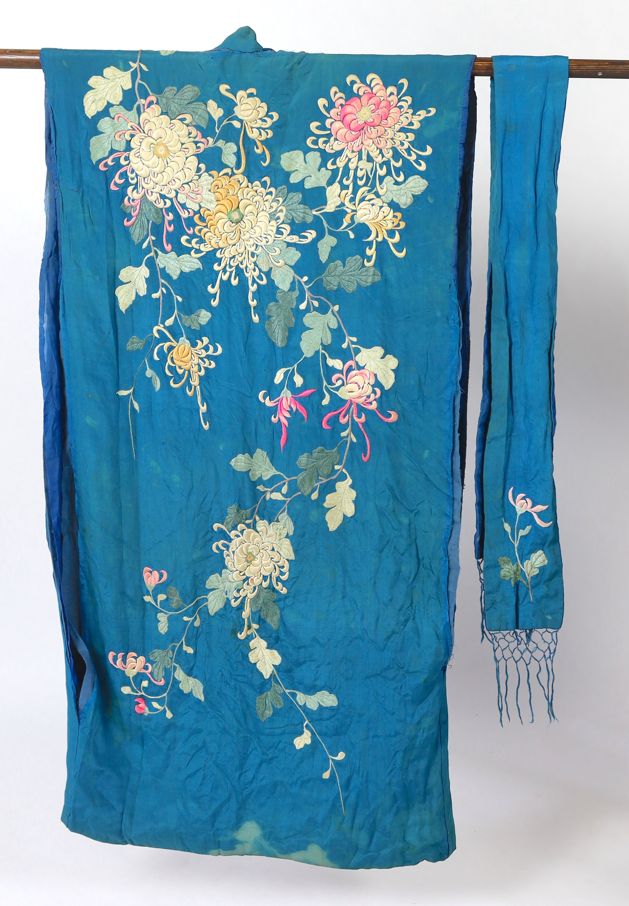 An early 20th century silk crêpe Japanese kimono and fringed tie belt, the back panel heavily embroidered with trailing chrysanthemum type flowers and leaves. This item is being sold for the back panel only and is with a